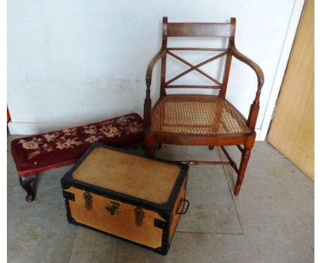 A caned carver chair, together with a long footstool, and a small metal strapped trunk (3) 