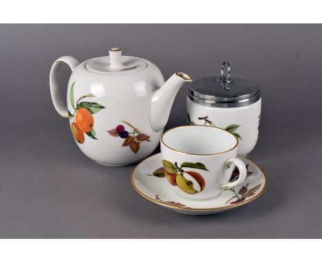 A Evesham pattern Royal Worcester tea service, consisting of (2) teapots, (2) Cream Jugs, (7) cups and saucers, (7) side plat