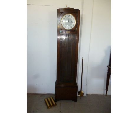 A 1950s Enfield longcase clock, with eight day movement striking and chiming on rods, complete with presentation plaque marke