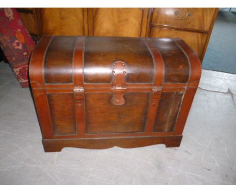 A reproduction leather strapped trunk, with press stud catches to the front 79 cm W  