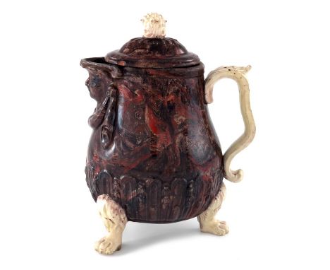 A Staffordshire Agateware coffee pot, circa 1750s, flattened baluster form, relief moulded with a band of fluted and foliate 