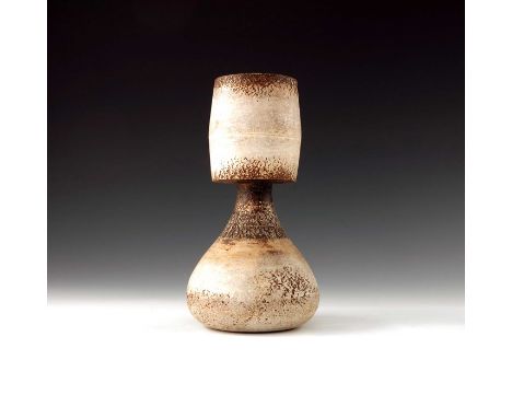 † Hans Coper (1920-1981), a studio pottery stoneware vase, 1964, the bulbous onion body with bowed cylindrical neck, incised 