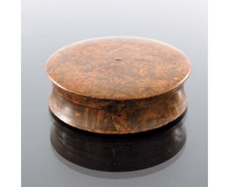 An early 19th century burr olive wood and tortoiseshell snuff box, circular form, turned and lined in shell, 6.5cm diameter