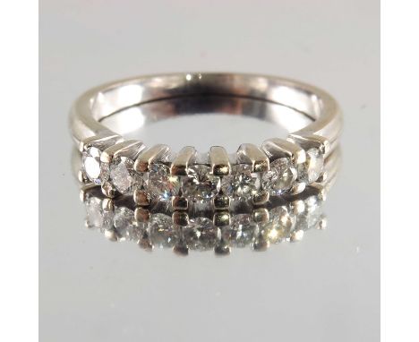 An 18ct gold brilliant-cut diamond half eternity ring, estimated total diamond weight 0.50ct, H-I colour, SI clarity, stamped