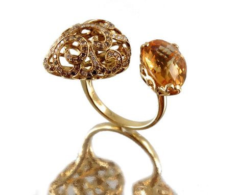 An 18ct gold citrine, diamond and brown diamond dress ring, with open band, estimated total diamond weight 0.60ct, hallmarks 