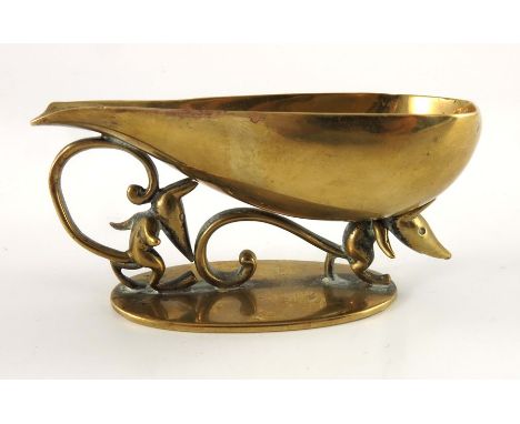 Karl Hagenauer, a brass pipe holder, after 1927, the bowl supported by two comical mice, stamped marks, 9cm long