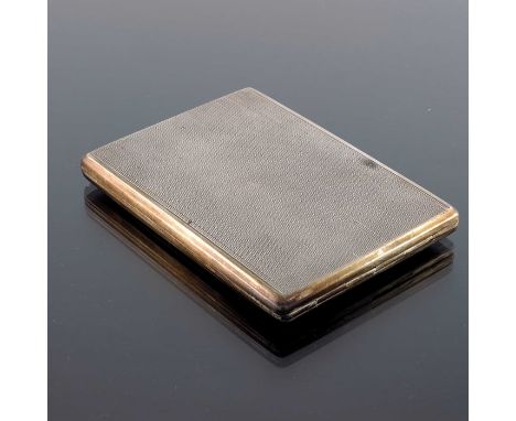 A Polish silver cigarette case, Warsaw circa 1940, rectangular with engine turned decoration, gilt interior, 7.5cm x 11cm, 4.