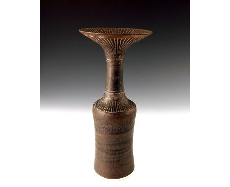 †&nbsp;Dame Lucie Rie (1902-1995), a studio porcelain bottle vase, circa 1975, cylindrical shouldered form with flaring neck,