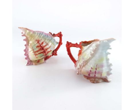 A near pair of Royal Bayreuth porcelain Spiky Shell creamer jugs, modelled in relief and painted, 10cm high (2)