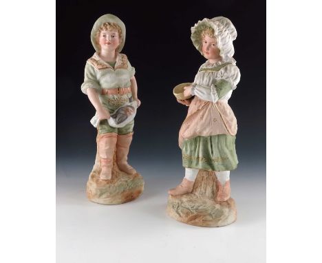 A pair of Gebruder Heubach bisque figures of fisher boy and cockle picker, both in blush and green costumes highlighted in gi