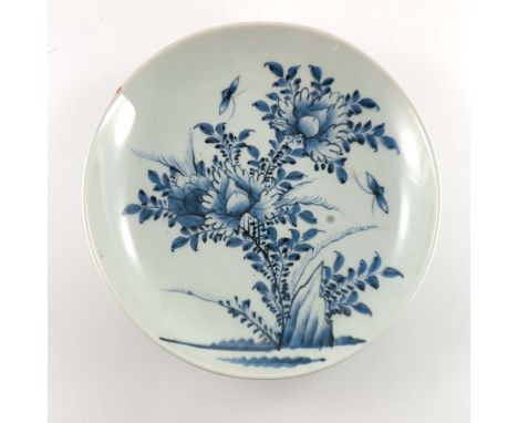 A Japanese Imari charger, 37cm long, together with a Japanese blue and white plate, painted with flowers, 31cm long (2)