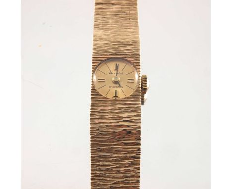 Accurist, a lady's 1960s 9ct gold textured bracelet watch, manual wind movement, hallmarks for London 1967, length 16.9cm inc