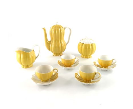 Josef Hoffmann, an Augarten porcelain Melone coffee set, designed 1929, Secessionist style, lobed and gourd form, yellow and 