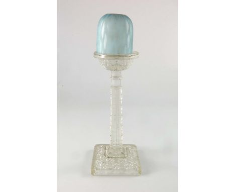 A Victorian mother of pearl diamond quilted glass fairy lamp on Clarke's moulded pedestal stand, blue pearlescent cased domed