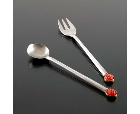 A Modernist silver, gilt and coral spoon and fork, circa 1980s, brushed, with oval gilt rimmed terminals set with carved reed
