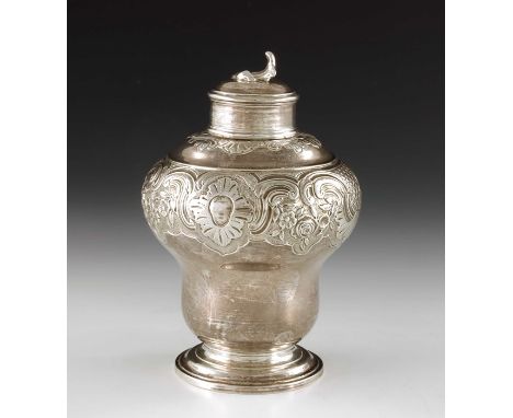A George II silver tea caddy, Peze Pilleau, London 1747, ogee baluster gourd form, on stepped foot, the body embossed and eng