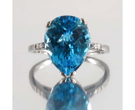 An 18ct gold pear-shape blue topaz single-stone ring, with circular-shape sapphire and brilliant-cut diamond line shoulders, 