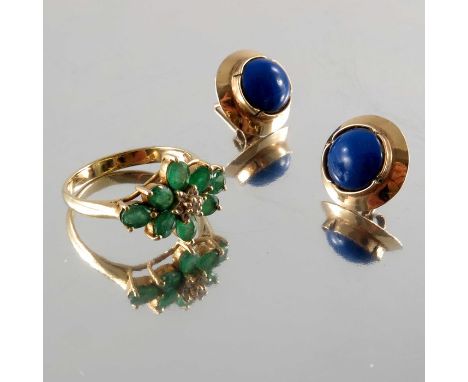 A pair of lapis lazuli cabochon earrings, together with an emerald and cubic zirconia floral dress ring, marks to indicate 9c