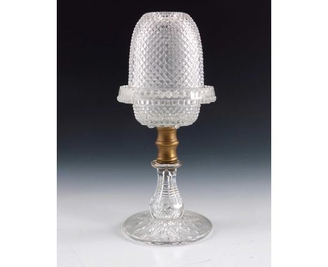 A Clarke's Cricklite table lamp, circa 1880,  moulded pan and shade, on baluster stem and circular foot,  the pan impressed '