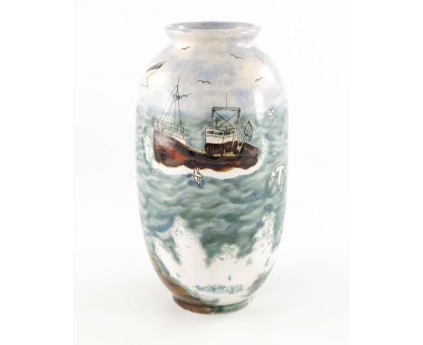 A Cobridge stoneware pottery vase with incised and painted decoration depicting a trawler in seascape, tapered cylindrical fo