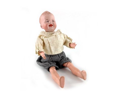 A Gebruder Heubach bisque headed doll, circa 1912, laughing boy No.8191, open mouth with teeth, painted eyes and moulded hair
