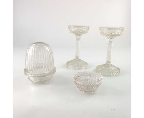 A Clarke's glass fairy lamp and a pair of pedestal stands, the domed shade with vertical ribs, the stands moulded with hobnai