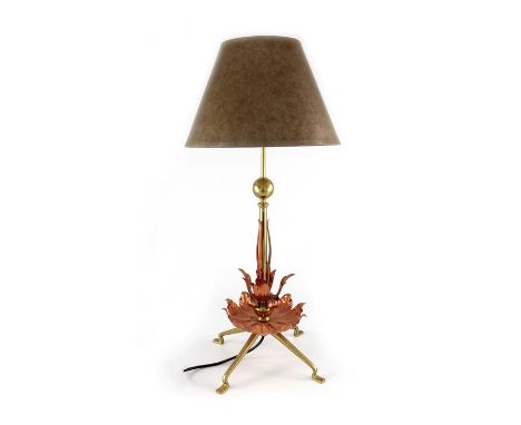 W A S Benson, an Arts and Crafts copper and brass table lamp, circa 1900, four angled whiplash feet, with a leafy tray below 