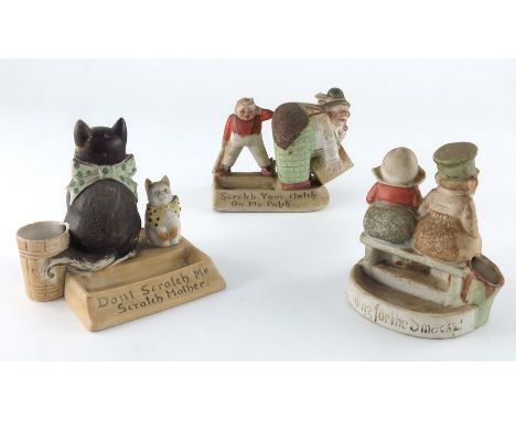 Three Schafer and Vater novelty bisque match strikers, modelled as figure groups of children and cats, 'Don't Scratch Me Scra
