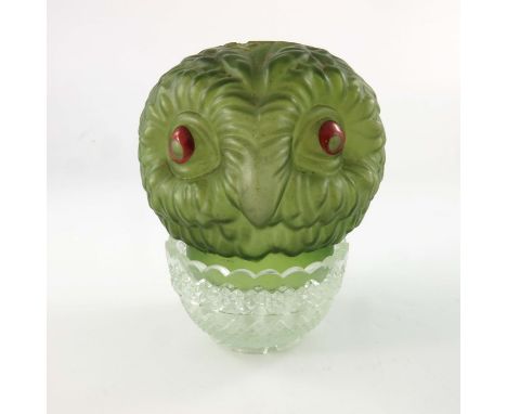 A Victorian novelty glass owl head fairy lamp, on Clarke's moulded glass stand, green with red enamelled eyes, 12cm high