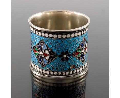 An Imperial Russian silver and cloisonne enamelled napkin ring, the central scroll band in turquoise, with foliate diamonds a