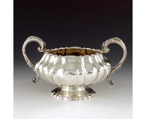 Paul Storr, a George IV silver twin handled bowl, London 1827, ogee lobed and footed ovoid form, with cast acanthus scroll ha