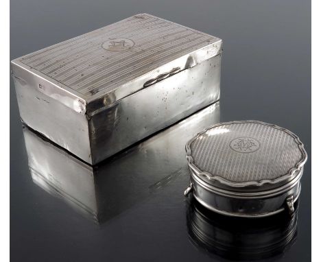 A George V silver cigarette box and jewellery casket, Birmingham 1919 and circa 1925, cuboid form with engine turned pin stri