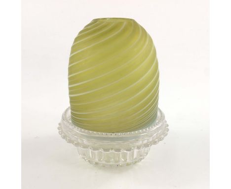 A Victorian green glass fairy lamp, on Clarke's stand, wrythen moulded with opaque glass stripe, 13.5cm high