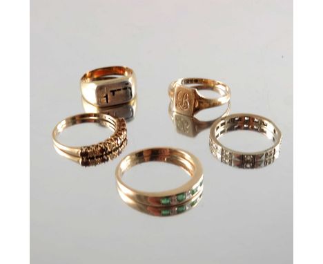 A selection of five gem-set rings, to include a 9ct gold emerald and diamond half eternity ring, a 9ct gold ruby and diamond 