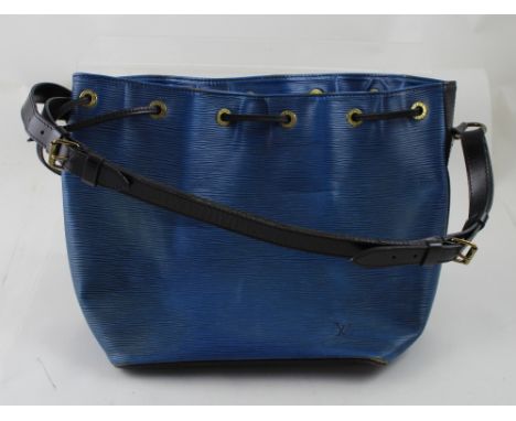Louis Vuitton; a c1980s textured blue and black leather bag with LV monogram to one side and zipped compartment to interior, 