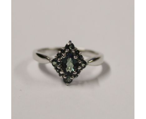 A 14ct white gold ladies' dress ring with marquise setting of green topaz, size N, approx 3.6g.