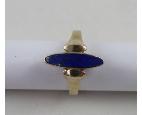 A 9ct yellow gold ladies' dress ring set with marquise lapis lazuli stone, size N, approx 3.6g.