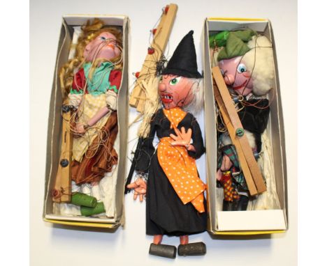 Two boxed Pelham Puppets, S M MacBoozie number 94, a boxed girl puppet in country clothing and an unboxed witch (3).
