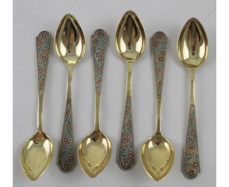 A set of six Russian silver gilt teaspoons with beaded and enamelled floral decorated handles, USSR period, length 14cm, appr