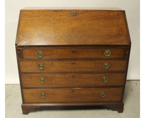 A 19th century mahogany bureau, drop-down desktop with interior pigeonholes and small drawers above four drawers to bracket s