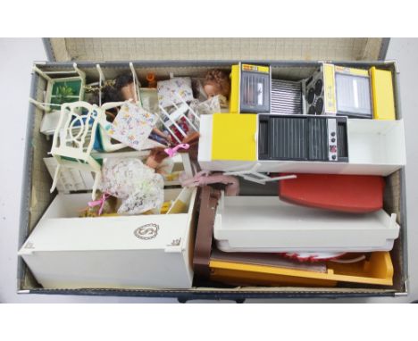 A vintage suitcase containing a large quantity of Sindy doll items to include wardrobe, cooker, pots, pans, Sindy doll etc.