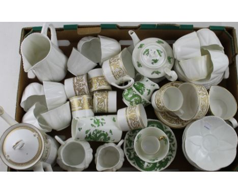 A Shelley all-white part tea service to include saucers, cups, creamer, milk jug and large jug, registration number 272101, a