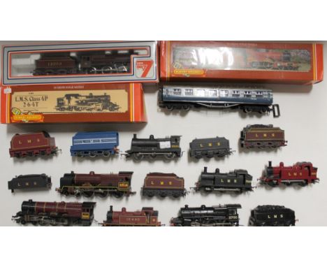 A boxed OO gauge LMS Class 4P 2-6-40 locomotive R.088, a boxed Lima MWG engine and tender 205119, a box containing three engi