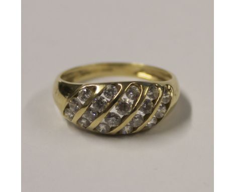 A 14ct yellow gold ladies' dress ring oval platform-set with cubic zirconia, size S, approx 3.3g.