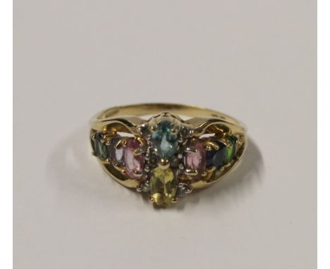 A 14ct yellow gold ladies' dress ring set with multicoloured topaz and tourmalines, size L, approx 4.7g.