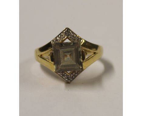 An 18ct yellow gold ladies' dress ring set with asscher-cut citrine and small diamond surround, size N, approx 6.1g.