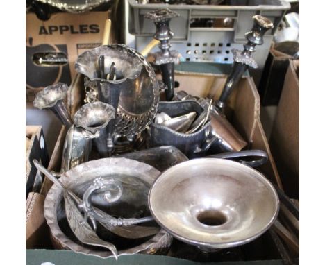 A quantity of metal and EPNS ware to include salvers, a pair of decorative candlesticks, large decorative floral ornament, a 
