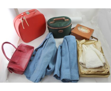 A vintage ladies' blue wool suit, a vintage Henderson's of Liverpool box containing an Edwardian children's white fur cape, a