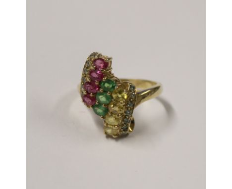 A 9ct yellow gold ladies' dress ring, stepped platform setting with multicoloured stones of pink topaz, tourmaline and green 