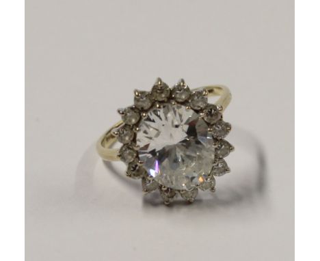 A 14ct yellow gold ladies' dress ring, floral-set with large white stones within a small white stone border, size Q, approx 5